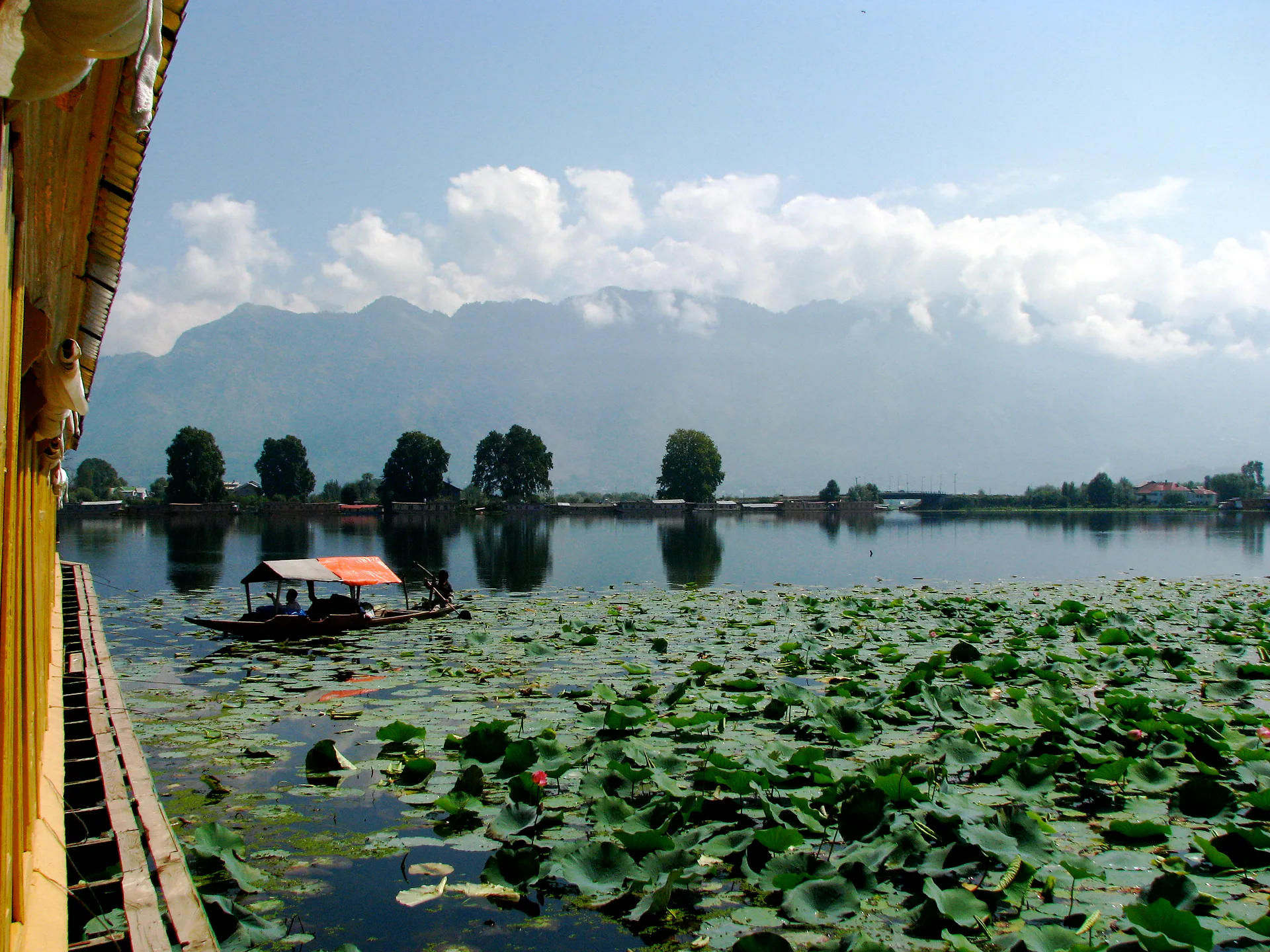 View from a houseboat window across Nigeen Lake to the mountains